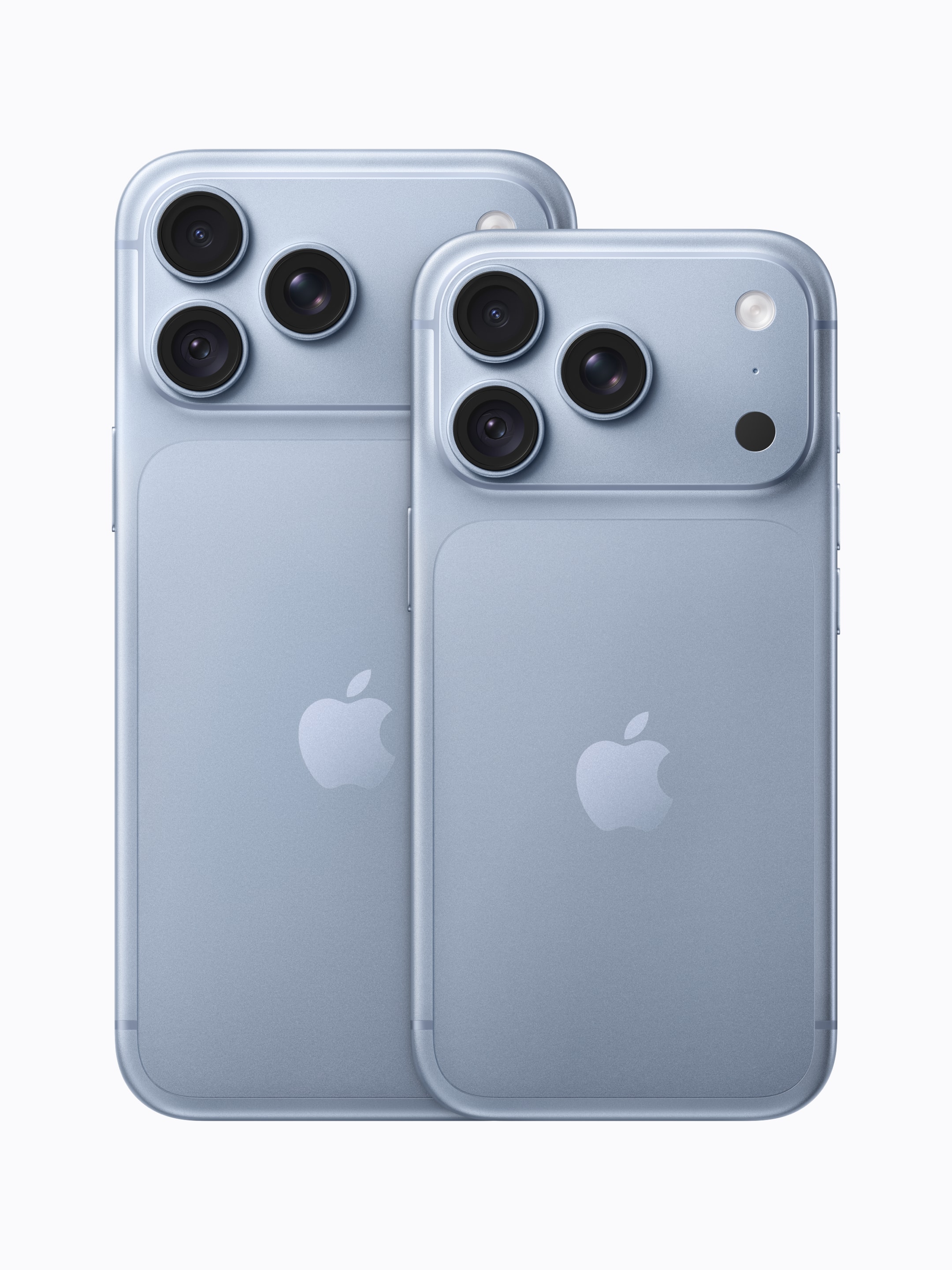 iPhone 18 Pro (foreground) and iPhone 18 Pro Max (background), rear views in Glacier